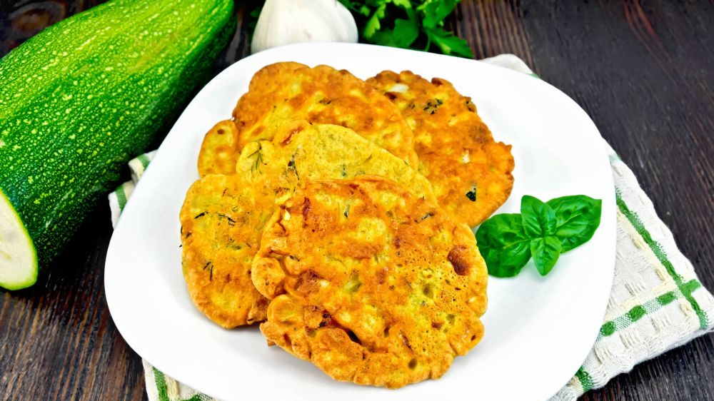 Оладьи из тыквы и кабачка: идеальный рецепт для любителей вкусно поесть Оладьи из тыквы и кабачка: идеальный рецепт для любителей вкусно поесть